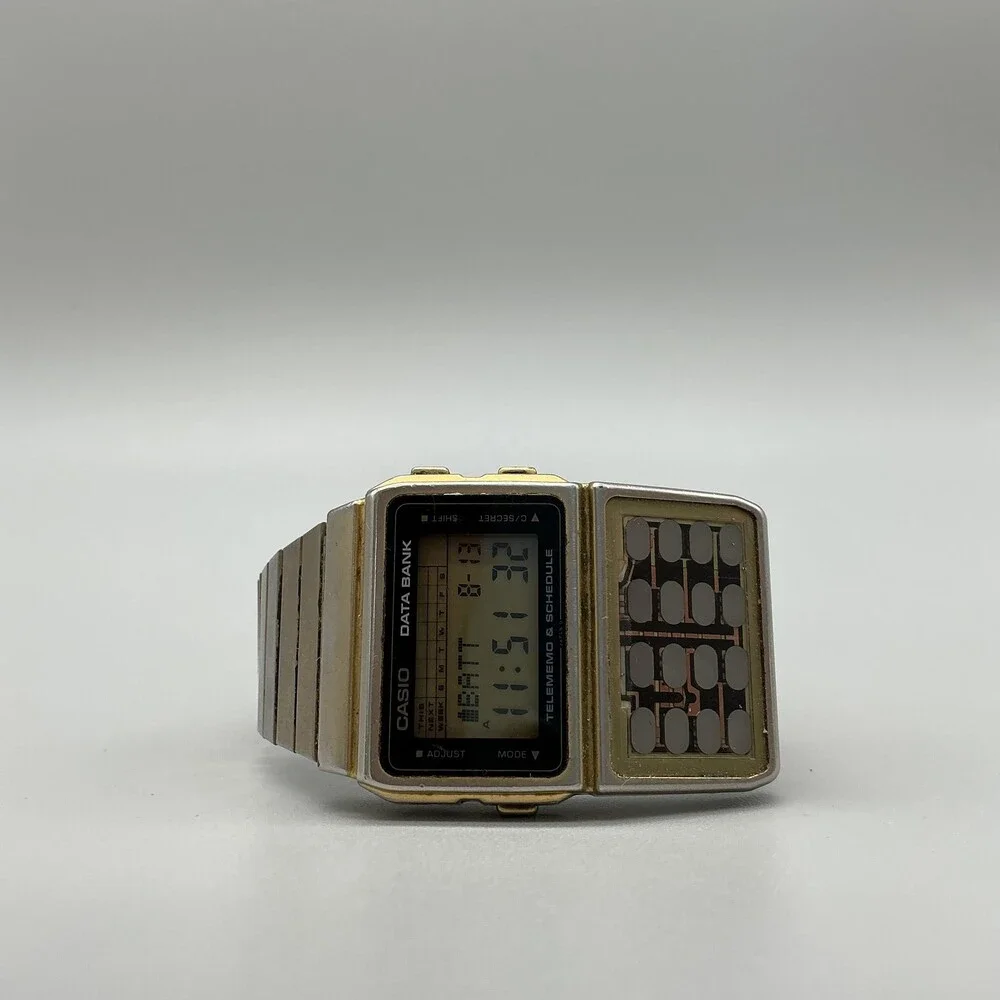 Vintage Casio DBC-610 Data Bank Mens Watch 32mm Gold Calculator Quartz Alarm